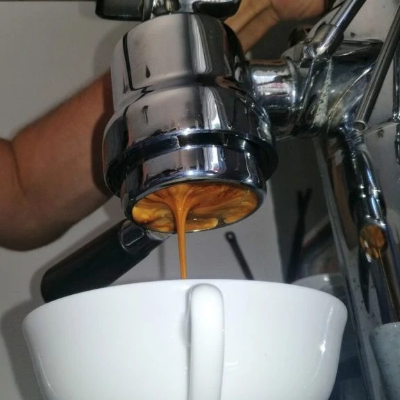 Espresso extraction on La Pavoni lever machine