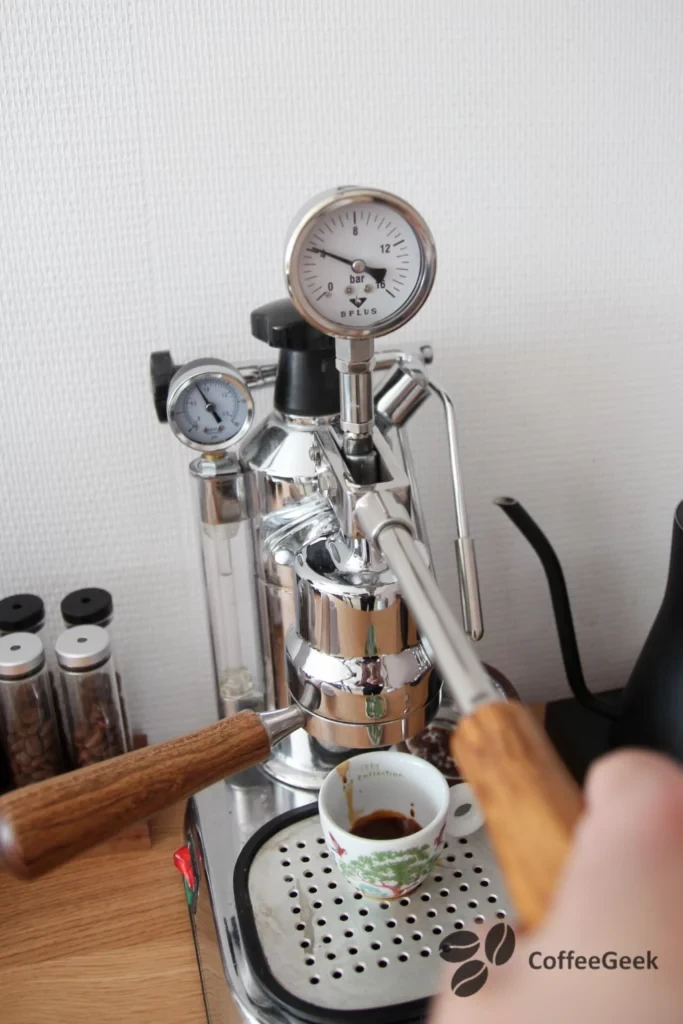 Raising the lever before attaching the portafilter