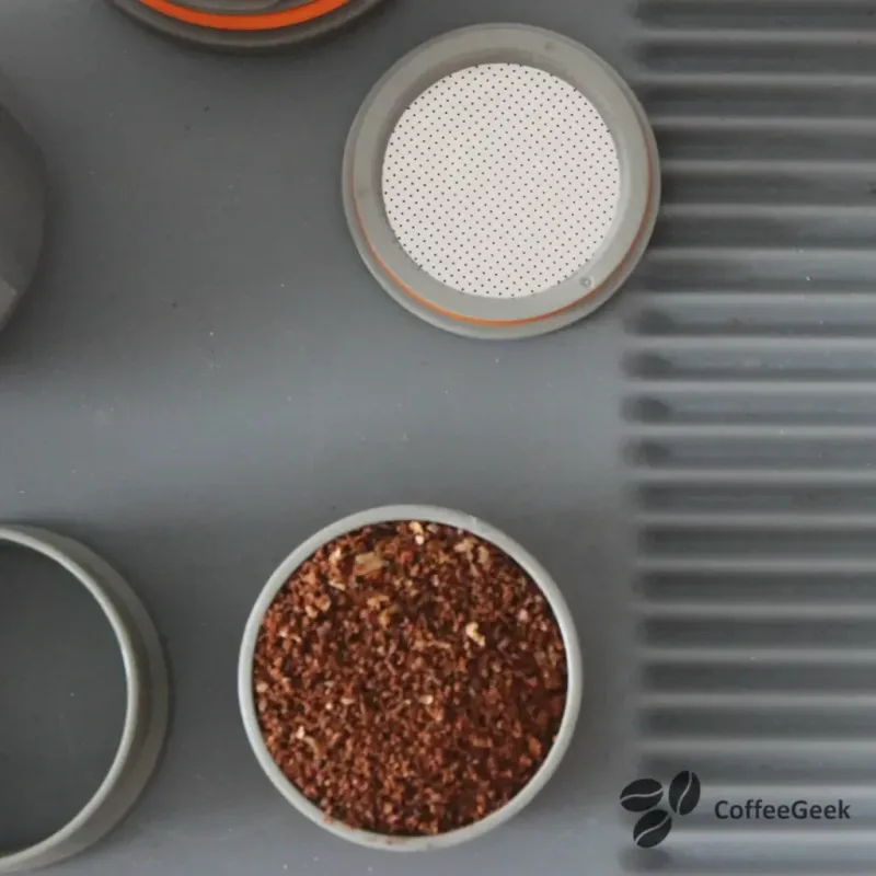Pouring coffee into capsule