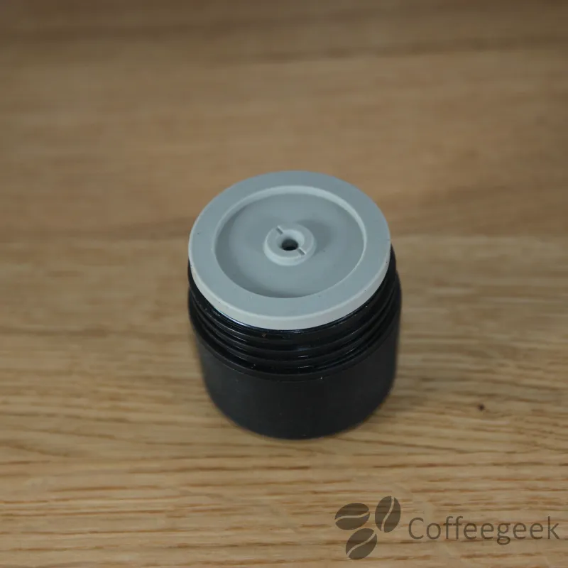 The valve is placed on the filter before assembly