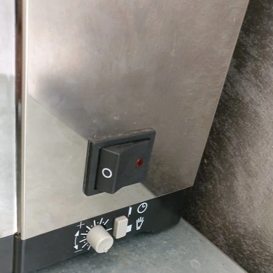 Botón de control del molino