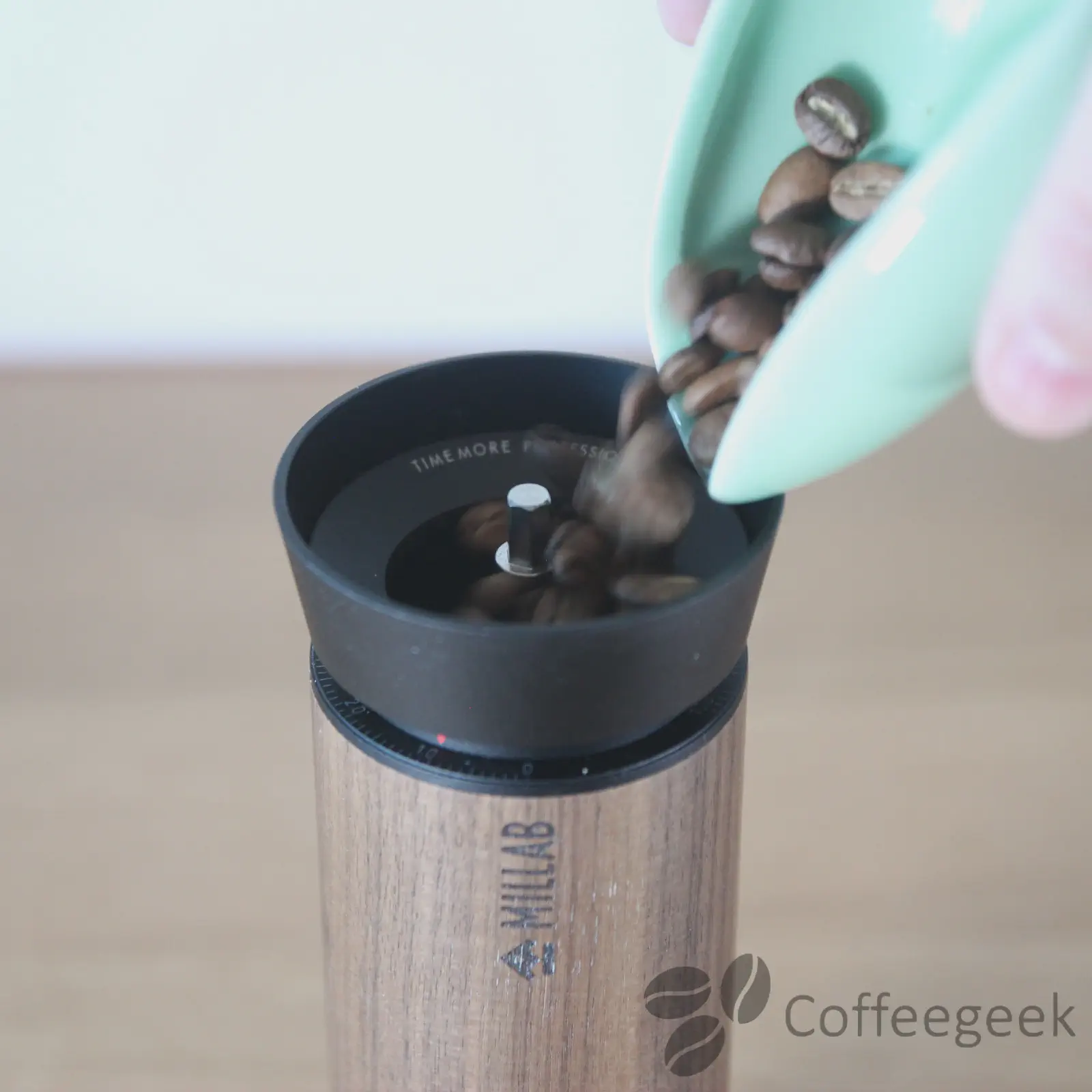 18g of coffee poured into the Timemore Millab M01