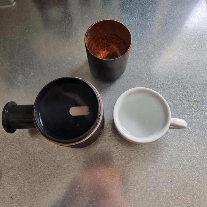 Begin van de bereiding van een espresso met de Picopresso